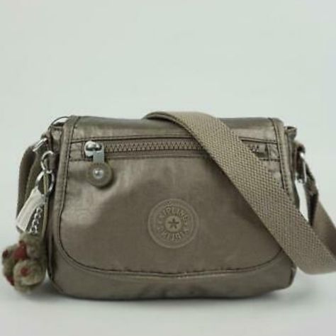 Color: Metallic Pewter 8"L X 6.7"H X 3" D Flap Closure With Magnetic Snap Front Slip Pocket Adjustable Strap Internal Zip Pocket Monkey Keychain Cross Body Bags Women Casual, Medium Size Bags Handbags, Kipling Shoulder Bag, Kipling Purse, Cross Body Bag Outfit, Mochila Kanken, Monkey Keychain, Everyday Bag Essentials, My Style Bags