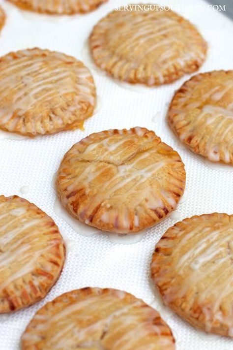 Lemon Hand Pies Lemon Hand Pies, Hostess Fruit Pies, Fruit Hand Pies, Hand Pie Recipes, Lemon Curd Recipe, Hand Pie, Christmas Baking Recipes, Curd Recipe, Lemon Glaze