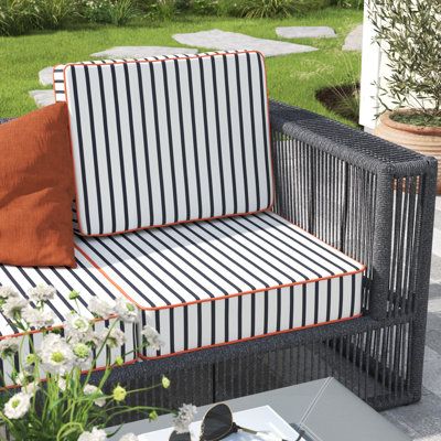 This Sunbrella is comprised of a crisp background, lined with a rich navy and deep stripes. A complete package for patio sofas, this sofa pillow and cushion set offers a stylish design that attracts attention. Coordinating cording creates a silhouette effect on covers made from durable outdoor fabric. Resistant to sun and moisture, they protect while offering supreme comfort on a fill of pure recycled fiber. This dynamic sofa pillow and cushion set brings a fabulously stylish look and feels to b Outdoor Lounge Cushions, Striped Couch, Sunbrella Outdoor Furniture, Sofa Fabrics, Outdoor Chair Cushions, Lounge Cushions, Chair Seat Cushion, Striped Cushions, Sunbrella Cushions