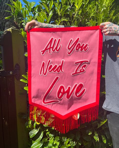 All You Need Is Love Banner Sewn together using layers of felt and added fringing for sass! 😂 This banner is a firm favourite and I love stitching lyrics onto these pieces 🎵 Also wanted to say hello and thank you to all the new people following or enquiring with The Huffing Dog 👋 DM or email to order your custom banner today 💌 thehuffingdog@gmail.com #banner #sign #thehuffingdog #etsy #etsykent #etsyuk #wedding #weddingbanner #weddingsign #weddingdecor #design #sew #stitch #screenprin... Fringe Banner, Bedroom Decor Wall Art, Bedroom Decor Wall, Banner Wedding, Felt Banner, Happy Pride, Wedding Banner, Fabric Banner, Couple Relationship