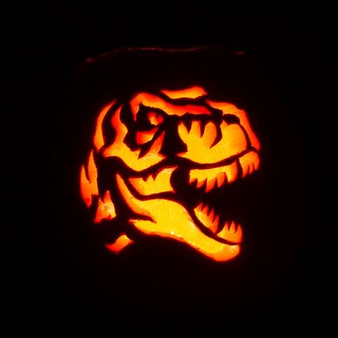 Dinosaur Tyrannosaurus Rex/T-Rex Jack-O-Lantern Carve Pumpkin Dinosaur Jack O Lantern, Pumpkin Carving Ideas Dinosaur, Dinosaur Pumpkin Carving, T Rex Pumpkin, Dinosaur Pumpkin, Pumpkin Contest Ideas, Pumpkin Carve, Pumpkin Carving Stencil, Halloween Pumpkin Stencils