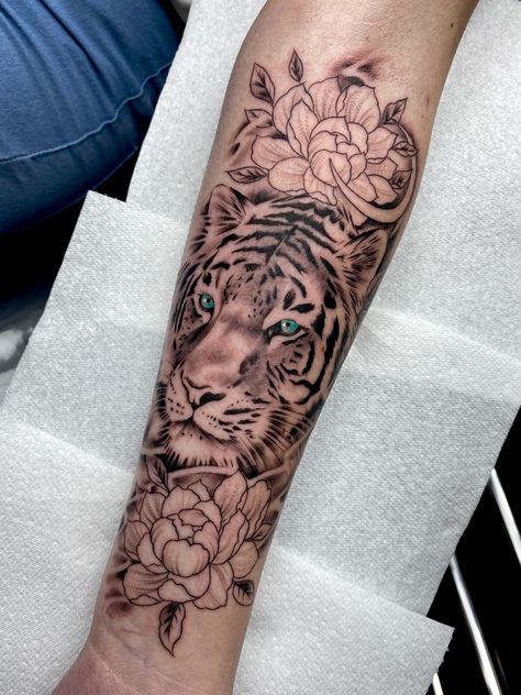 Tiger And Flowers Tattoo, Tiger Floral Tattoo For Women, Tiger Flower Sleeve Tattoo, Tiger And Floral Tattoo Design, Arm Tattoos Tiger, Floral Tiger Tattoo Design, Tiger Forearm Tattoo, Lion Forearm Tattoos, Outer Forearm Tattoo