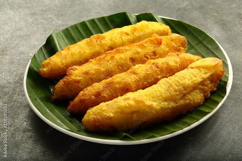 Kerala snack foods- banana fry- pazham pori . Stock Photo | Adobe Stock Pazham Pori, Kerala Snacks, Banana Desserts, Banana Frita, South Indian Snacks, Unripe Banana, Banana Fritters, Raw Banana, Kanyakumari