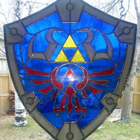 You searched for: VigilanteGlass! Discover the unique items that VigilanteGlass creates. At Etsy, we pride ourselves on our global community of sellers. Each Etsy seller helps contribute to a global marketplace of creative goods. By supporting VigilanteGlass, you’re supporting a small business, and, in turn, Etsy! Hylian Shield, Stain Glass Ideas, Glass Store, Glass Shield, Making Stained Glass, Stained Glass Decor, Mosaic Stained, Glass Diy, Stained Glass Diy