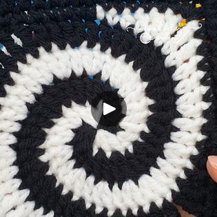 Crochet Spiral Granny Square | How fun is this Spiral Granny Square! 😎🧶 | By Hooked by Robin | Today, I'm going to be showing
you how to crochet these really fun spiral granny squares. Now,
they look amazing when worked in two colors like my black and
white ones here but they look equally fantastic when using
four different colors. Now, this granny square lies
completely flat so we can avoid the puckering in the middle
that some spiral grannies get just by a few slight tweaks
with the stitches that we start with. I'll take you through
step by step exactly how you make these granny squares. So
let's jump straight on in! For my spiral granny I used two
colours, black and white. Now I actually used four balls of
yarn. So I had two balls of black yarn and two balls of
white yarn to make this Spiral Granny Square Pattern, Spiral Granny Square, Spiral Crochet Pattern, Hooked By Robin, Crochet Spiral, Spiral Crochet, Balls Of Yarn, Granny Squares Pattern, My Black