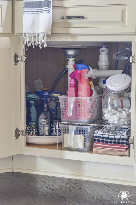 Organization for Under the Kitchen Sink (perfect for corner sinks or if you have a bulky garbage disposal!) #organization #kitchensink #sinkorganization #cabinetorganization #organized #kitchenorganization #cleaningsupplies Under The Kitchen Sink Organization, Corner Sinks, Under The Sink Storage, Under The Kitchen Sink, Under Kitchen Sink, Organize Life, Kitchen Sink Organization, Under Sink Storage, Under Sink Organization