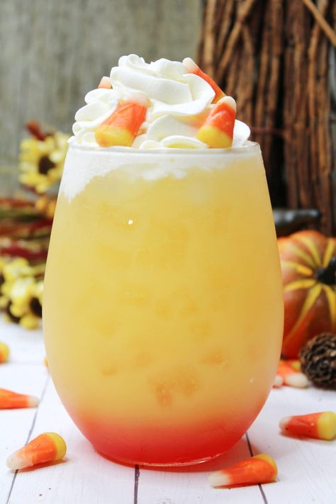 This Candy Corn Cocktail looks like tasty Halloween candy using Whipped Cream Vodka, White Rum, Pineapple Juice, and Grenadine. #recipes #drinks #halloween Whipped Vodka Drinks, Candy Corn Drinks, Corn Cocktail, Cook Desserts, Drinks With Pineapple Juice, Candy Corn Recipe, Whipped Vodka, Whipped Cream Vodka, Candy Cocktails