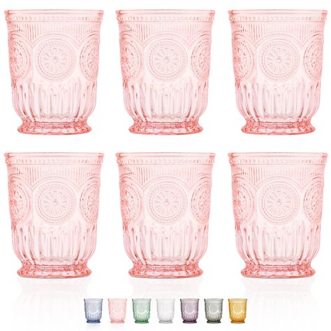 PRICES MAY VARY. Yunglala pretty pink glass cups make perfect water glasses when entertaining. They give that pop of color your dining table needs. Best of all when you are finished entertaining they can go straight in the dishwasher. The color wont fade, chip or peel because it is part of the glass, not just painted on. Embossed in the glass is a vintage sunflower design and the unique foot on the glass makes it super cute. The quality of the glass is obvious, there is a lustre and sparkle with Pink Drinking Glasses, Fancy Glassware, Colored Drinking Glasses, Pink Wine Glasses, Glass Cup Set, Vintage Drinking Glasses, Pink Glassware, Blue Glassware, Pink Cups