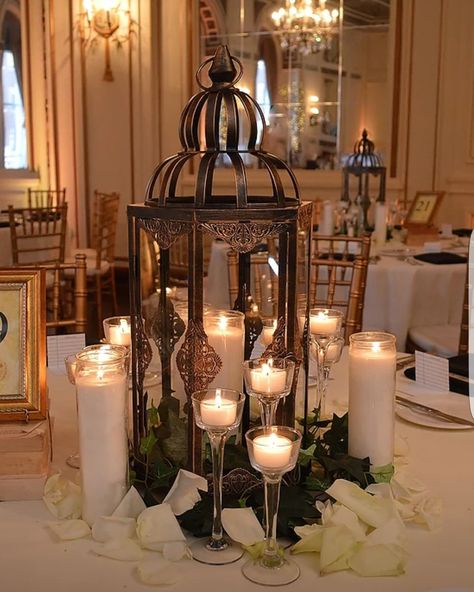 Candle And Lantern Centerpieces Wedding, Antique Lantern Centerpieces, Lanterns Stage Decor, Vintage Lantern Centerpieces, Lantern And Candle Centerpieces, Lantern Centerpieces Wedding, Lantern Wedding Decor, Black Lantern Centerpiece, Table Centerpieces Wedding Candles