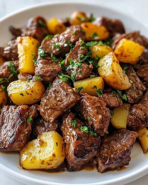 Chef Marion Grasby | GARLIC BUTTER STEAK AND POTATOES SKILLET Butter Steak Bites And Potatoes, Steak Bites And Potatoes, Steak And Potatoes Skillet, Pepper Steak And Onions, Butter Steak And Potatoes, Garlic Butter Steak And Potatoes, Potatoes Skillet, Garlic Butter Steak Bites, Butter Steak Bites