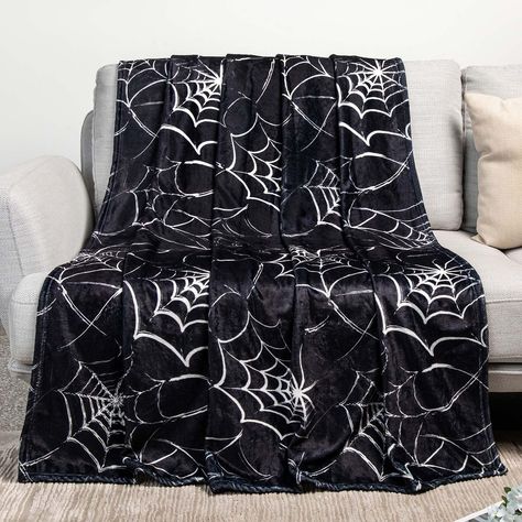 PRICES MAY VARY. 【𝐔𝐥𝐭𝐫𝐚-𝐒𝐨𝐟𝐭 𝐁𝐥𝐚𝐧𝐤𝐞𝐭 𝐌𝐚𝐭𝐞𝐫𝐢𝐚𝐥】Our Throw blanket is made of anti-pilling flannel, which has a velvety plush feel. It quickly returns to a dry and fluffy state after washing and drying, and can be used for a long time without deformation. 【𝐒𝐢𝐳𝐞 𝐃𝐞𝐭𝐚𝐢𝐥𝐬】There are two sizes to choose from, 50"X40"=130 X 100cm, 60"X50"=150 X 130cm. Suitable for children, adults, parents and grandparents. 【𝐔𝐧𝐢𝐪𝐮𝐞 𝐃𝐞𝐬𝐢𝐠𝐧】Our gothic blanket features bats, sk Throw Blanket Cute, Goth Blankets, Spiderweb Blanket, Goth Blanket, Goth Bedding, Spooky Room Decor, Spooky Blanket, Skeleton Blanket, Gothic Blanket