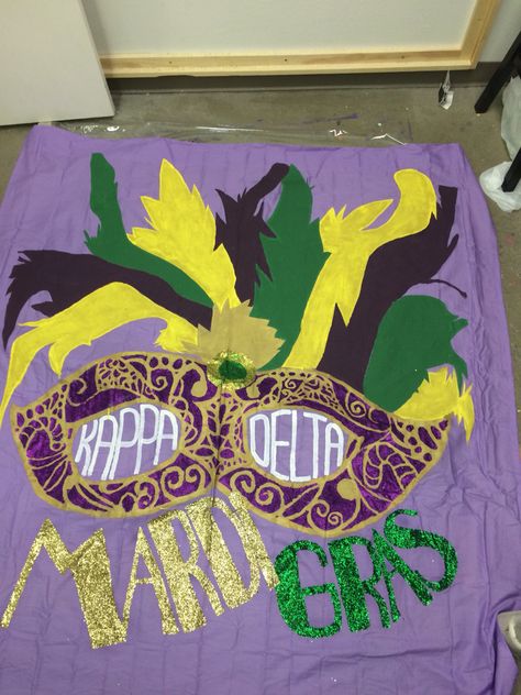 The final product: Mardi Gras theme Date Party Banner by Kari Slocum. Mardi Gras Homecoming Theme, Mardi Gras Sorority, Mardi Gras Office Decorations, Mardi Gras Date Party Sorority, Mardi Gras Poster Ideas, Mardi Gras Banner, Horse Barn Decor, Mardi Gras Flag, Mardi Gra