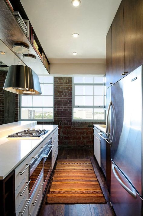 Light-filled Houston loft by CONTENT Architecture Loft Kitchen Industrial, Kitchen Island Vent, Island Vent Hood, Contemporary Loft, Loft Kitchen, Kitchens Luxury, Bates Motel, Lighting Plan, Vent Hood