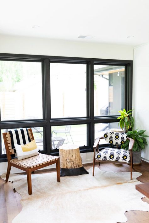 Thinking about Ideas for black window trim? See Tricorn Black on interior windows and doors. Sherwin Williams to the rescue- Tricorn black works in all spaces. Painted Black Window Trim, Black Window Trim Interior Diy, Interior Black Window Trim, White Walls Black Window Trim, Painting Interior Windows Black, Black Painted Window Trim, Black Interior Windows With Black Trim, Black Trim Windows Interior Living Rooms, Black Interior Window Trim