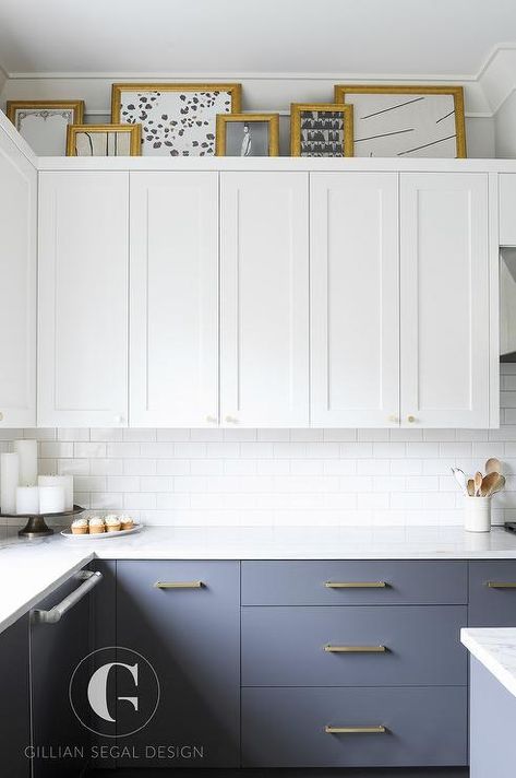 White and gray kitchen design boasting brass hardware- small round brass knobs on white shaker upper cabinets and long brass pulls on flat front lower gray cabinets. Gray Kitchen Design, Flat Panel Kitchen Cabinets, White And Gray Kitchen, Upper Kitchen Cabinets, Grey Kitchen Designs, Gray Cabinets, Gray Kitchen, New Kitchen Cabinets, Grey Kitchen Cabinets