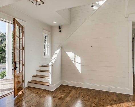 Basement Stairs At Entryway, Mudroom Next To Stairs, Mud Room With Stairs, Mudroom Stairs Entryway, Mudroom With Stairs, Beach Cottage Style Bungalows, Mudroom Build, Beach Cottage Style Exterior, Beach Cottage Style Bedroom