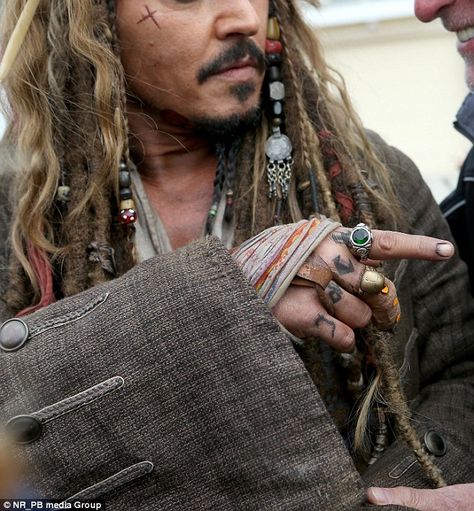 Ouch! A bandage wrapped around his right hand's middle finger proved that he was still on the mend from his March surgery Jack Sparrow Rings, Bandaged Hands, Jack Sparrow Costume, Pirate Garb, John Depp, Johnny Depp Characters, Dead Men Tell No Tales, Pirate Jewelry, Halloween Coustumes