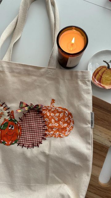 Leah on Instagram: "Cutest lil diy! Super easy too! I will be uploading a full tutorial to my YouTube channel! For supplies needed: Comment TOTE below to receive a DM with the link to shop this post on my LTK ⬇ https://liketk.it/4PCEb

Pumpkin Fall diy tote  #ltkvideo #ltkseasonal #fallvibes #autumn #fallcraft #gilmoregirls #pumpkin #diycrafts #leahsguides" Fall Tote Bag, Fall Tote, Diy Tote, Decorating Party, Diy Tote Bag, Pumpkin Fall, Fall Diy, Craft Inspiration, Cozy Fall