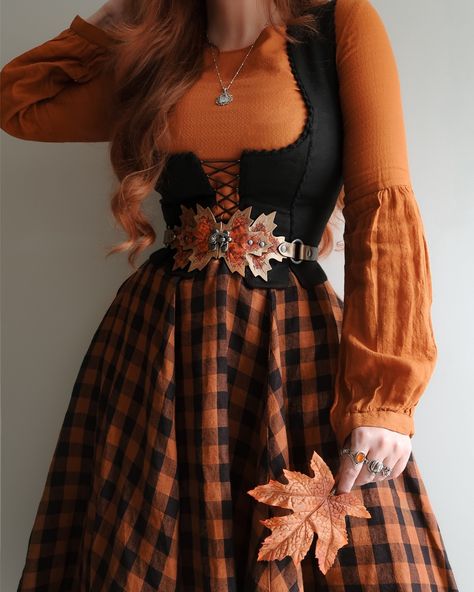 Witch way to the pumpkin patch? 🎃🍁🥧 . A little recreation of an outfit from last year with some Fall favourites 🍁🍂 thanks to my loves @sondeflor , for the perfect pumpkin patch skirt, @voriagh for the most gorgeous black linen bustier and @foxesandravens for the most MAGICAL maple leaf belt of my autumn loving dreams aghhh 🥹🍁😭 I’m still not over this piece! I have lots more spooky ssn ‘fits on the way with all of these Fall faves, but I thought they all went so well together, so why not recr... Fall Ren Faire Outfit, Orange Witch Outfit, Fitted Fantasy Costume For Fall, Autumncore Outfit, Fall Cosplay Corset Dress, Orange Goth Outfit, Boho Fall Fashion, 21 Birthday Outfit, Ren Faire Outfits