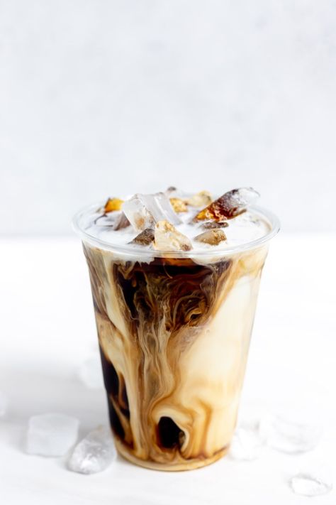 Homemade Keto Iced Coffee is so easy and tastes fantastic! Skip the Starbucks drive-thru and make your low carb coffee at home with cold brew coffee, Keto friendly sweetener, vanilla extract and heavy cream. #ketocoffee #icedcoffee #coffeerecipes #lowcarbrecipes #ketorecipes #lowcarb #keto Keto Iced Coffee, Coffee Smoothie Recipes, Iced Coffee Recipes, Coffee Keto, Keto Coffee Recipe, Iced Coffee Protein Shake, Coffee Protein Shake, Drinks Ideas, Making Cold Brew Coffee