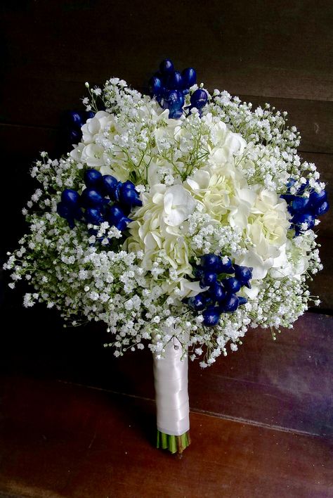 Bouquet by bloominGail's. White hydrangea, baby's breath and navy blue hypericum berries. Dark Blue And White Bouquet, Navy Blue Prom Bouquet, Navy Blue Flowers Bouquet, Blue Flower Centerpieces, Hoco Flowers, Ffa Banquet, Prom Flowers Bouquet, Prom Bouquet, Dark Blue Wedding