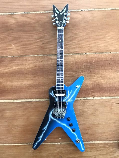 Amazon.com: Pantera - Dimebag Darrell from Hell Lightning Bolt Replica Miniature Guitar Model : Toys & Games Lightning Guitar, Dimebag Guitar, Dimebag Darrell Guitar, Jaguar Guitar, Miniature Guitars, Dimebag Darrell, Pedal Steel Guitar, Amazon Com, Lightning Bolt