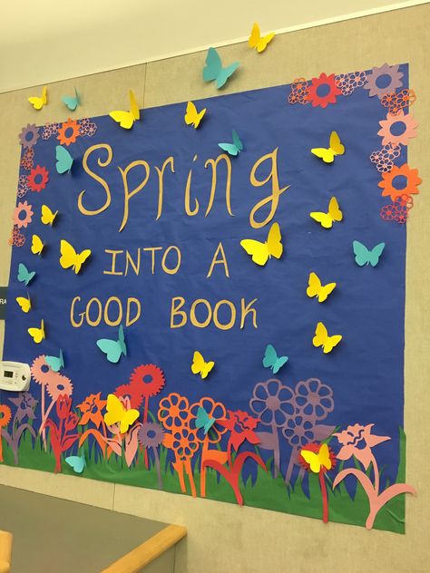 Spring Into A Good Book Bulletin Board, Spring Book Display Libraries, May Library Bulletin Boards, April Book Displays, April Library Bulletin Boards, Library Spring Bulletin Boards, April Library Bulletin Board Ideas, Spring Reading Bulletin Boards, Spring Library Bulletin Board Ideas