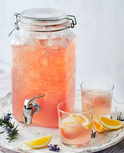 Celebrate the long weekend with this refreshing cocktail made for sharing at summer gatherings. Makes one large jug or lemonade fountain (pictured) Cocktail Jugs, Gin Lemonade, Gin And Lemonade, Gin Drink Recipes, Pitcher Cocktails, Pitcher Drinks, Cocktail Pitcher, Lemonade Cocktail, Batch Cocktails