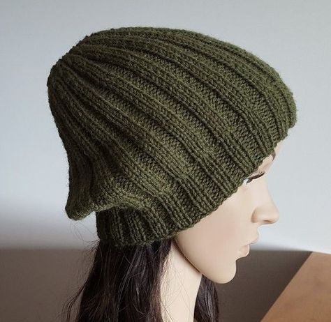 This 8ply Beanie has a 2x2 rib brim then increases out to a 3x3 rib. It can be worn as a slouchy Beanie or turn up the brim to create a firm fit Beanie.  Pattern sizes: Age 2-5 yrs, 6-10 yrs, Teen, Lady and Man.  To fit head: 52 (54-55-56-59) cm [20½ (21¼-21¾-22-23) ins].  Tension: 22 sts and 30 rows to 10cm [4 ins] over stocking st, using 4.00mm needles.  Pattern rating: Easy.  Please note that this pattern is protected by copyright and you do not have permission to copy or resell this pattern. Beanie Pattern Free, Beanie Knitting Patterns Free, Beanie Knitting, Crochet Yarns, Beanie Pattern, Online Pattern, Slouchy Beanie, Turn Up, Baby Knitting Patterns