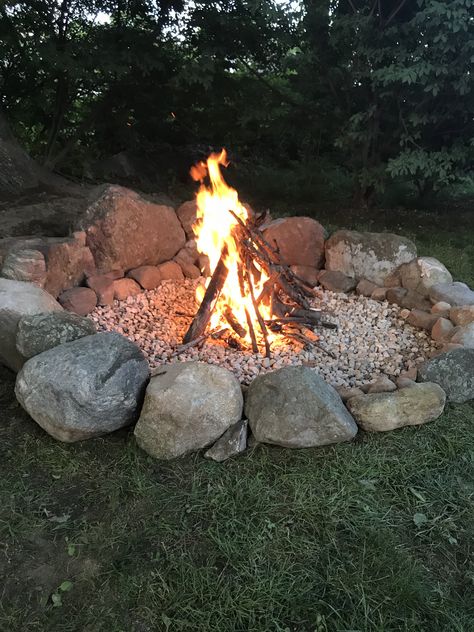 In Ground Bonfire Pit, Fire Pit Lakeside, Wood Firepits Backyard, Campsite Fire Pit Ideas, Basic Fire Pit, Western Fire Pit, Rustic Rock Fire Pit, Large Rock Fire Pit, Recycled Fire Pit