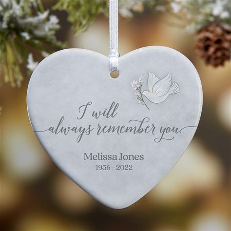 Personalize with any name and years Ornament may be displayed on a Christmas Tree or ornament standIncludes a ribbon for easy hanging; some assembly requiredMeasures 3.25" W x 3" H100% ceramicGlossy finishImported The Always Remember You Personalized Heart Ornament makes a beautiful keepsake to hang on your tree to remember your loved one. Candle Ornament, Ornament Stand, Laser Cut Wood Crafts, Memory Crafts, Personalized Throw Pillow, Always Remember You, Memorial Garden, Memorial Ornaments, 21st Gifts