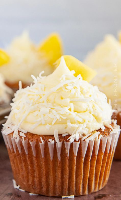 These Piña Colada Cupcakes are light and fluffy coconut cakes, topped with coconut frosting, fresh pineapple chunks, and sweetened coconut. Perfect for Cinco de Mayo, summer parties, celebrations, and more! Weeknight Desserts, Grad Cupcakes, Homemade Pina Colada, Dessert Pineapple, Mint Chocolate Cupcakes, Pina Colada Cupcakes, Coconut Cakes, Vanilla Bean Cupcakes, Coconut Icing