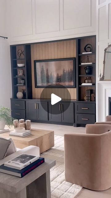 Annie Mescall on Instagram: "How to fill your empty walls! ⭐️ Comment “LINK” for a direct link of our living room! Design a built in that is made just for your home. We drew out this built in and added onto it as time went by. Where we live, starting price is around $4,800 and goes up based on size, wood type, paint, stain, ect. We added the plywood on the back and this is the original color of it. Paint is Benjamin Moore ONYX in Satin. #ltkhome #customhomes #builtins #homebuilding #livingroomdesigns #houstonhomes #transitionaldecor" Annie Mescall, January 23, Living Room Design, Empty Wall, Transitional Decor, Paint Stain, Benjamin Moore, Interior Design Trends, Built Ins