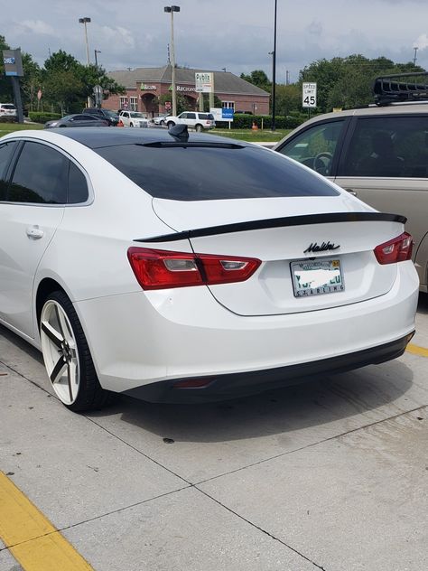 2017 panda Chevy Malibu 20" rims vynil wrap roof black trunk lip blackout lettering original 64 chevy Malibu emblem Chevy Malibu Custom, Chevy Malibu Interior, 2020 Chevy Malibu, Black Chevy Malibu, 2019 Chevy Malibu, 2016 Chevy Malibu, Black Malibu Car, Malibu Car, Chevy Malibu 2017