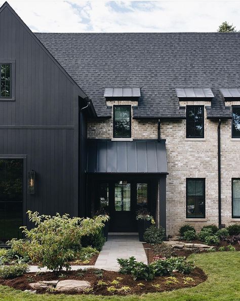 Brick Front Exterior, White Brick Black Siding, Stone And Black House Exterior, Black Paint Sherwin Williams, Black House With Stone, Dark Brick Exterior, James Hardie Iron Gray, Sherwin Williams Black Magic, Black Brick House Exterior