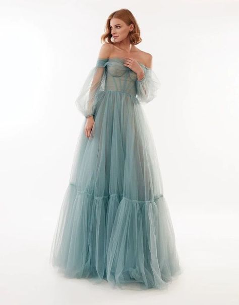 This fairytale Milla Nova evening gown features a draped corset bodice with flowy semi-sheer skirt. Pair it with detachable puffed sleeves for any special occasions! Gown Off Shoulder, Blue Evening Dress, Tulle Maxi Skirt, Tulle Evening Dress, Evening Dresses With Sleeves, Sweetheart Prom Dress, Blue Evening Dresses, Dress Sleeve Styles, Long Evening Gowns