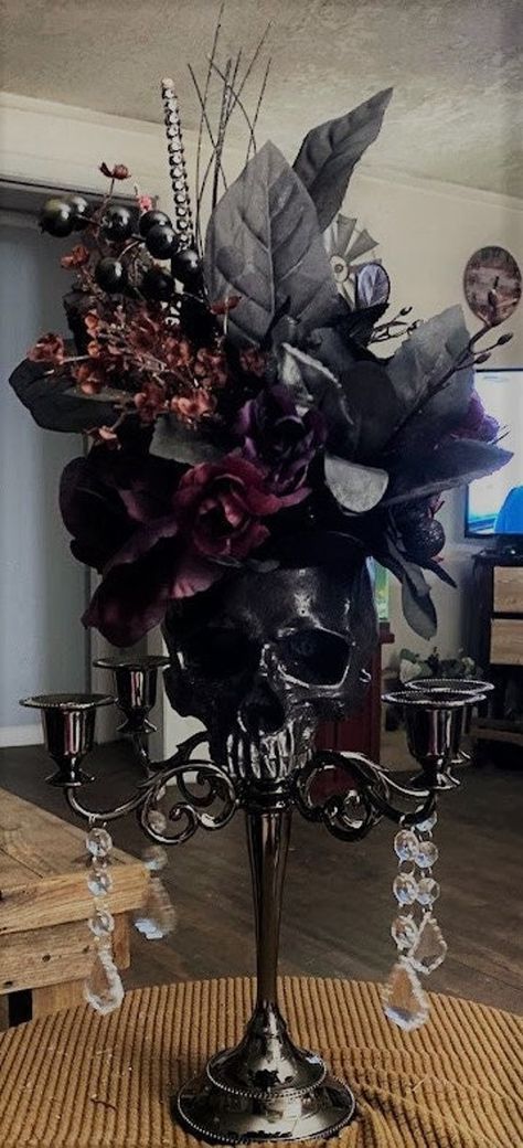 If you love gothic and you want something made special contact me.  This is some Candelabra's decor I made.  I am available to take special request and create your wedding decor too.  Everything was made by design.  I love making unique wedding bouquets and decor to fit the bride's dream for her wedding day. I will take special orders for theme, color, shape and style.    Pricing is for this centerpiece with variations.  Price will change depending on what you would like and the changes you make Skull Centerpiece, Dark Romantic Wedding, Gothic Wedding Theme, Vampire Wedding, Dark Wedding Theme, Unique Wedding Bouquet, Halloween Themed Wedding, Wedding Centrepieces, Skull Wedding