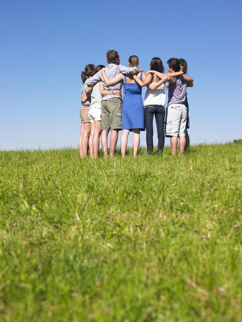 Group of People in Huddle in Field. A group of people huddle in a field. Vertica , #ad, #Field, #group, #Huddle, #Group, #People #ad Friends Reunion, Group Hug, Island Town, A Group Of People, Group Of People, Group Of Friends, A Group, Stock Photography, Photo Image