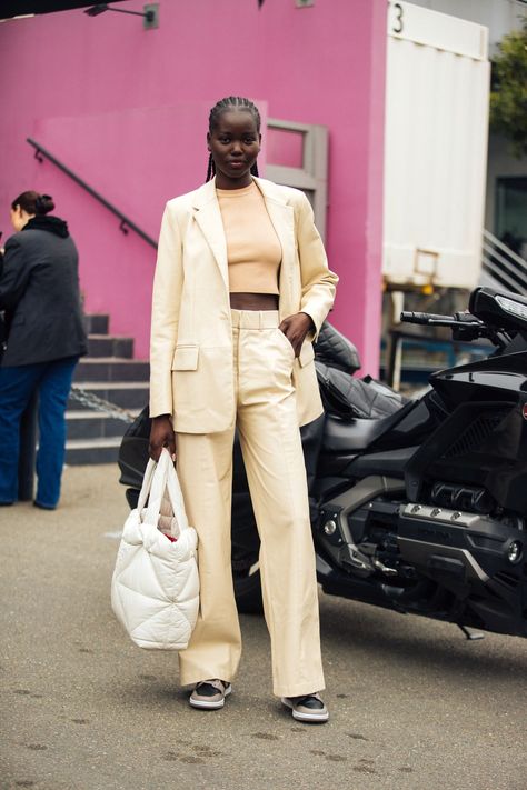 There’s no denying the wow factor of off-duty supermodel outfits. Tap to see how you can get the look too. Supermodel Street Style, Supermodel Outfits, Adut Akech, Denim Skirt Trend, All Black Looks, Skirt Trends, Vogue Uk, Tie Dye Maxi, Strappy Sandals Heels