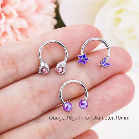 One package includes there pieces purple septum rings. Bar Thickness: 16g(1.2mm); Inner Diameter: 10mm Material: 316L Stainless Steel  Purple butterfly,purple dragon claw,purple basic ball Design CBR combination,Purple is now more and more popular, so we specially designed this purple combination, combined with popular elements, can match your clothes, show your style. The daith earring is made of 316L Surgical Steel, Hypoallergenic, Nickle and Lead Free, Harmless to Your Piercing and Shorten th Bijoux Piercing Septum, Purple Combination, Septum Piercing Jewelry, Daith Earring, Butterfly Purple, Septum Rings, Tragus Jewelry, Jewelry Butterfly, Helix Piercing Jewelry