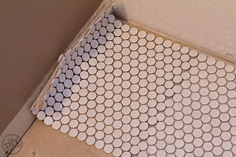 Laying-Out-Penny-Tile Diy Penny Tile Floor, How To Lay Penny Tile Floor, Airstream Bathroom, Penny Tile Floors, Bathroom Renovation Diy, Penny Floor, Beachy Bathroom, House Flip, Patterned Tile