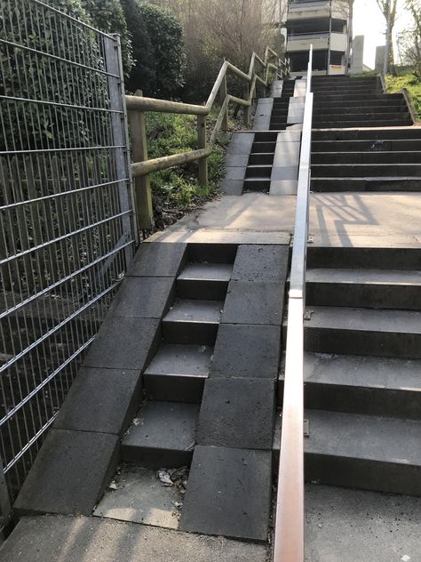 This stairwell near my house has a ramp for wheelchairs/strollers with another staircase for the person pushing them. Ramp On Stairs, Wheelchair Stairs, Ramp And Stairs Architecture, Ramps For Wheelchairs, Stair Ramp, Front Porch Stairs, Paver Deck, Ramp Stairs, Outside Stairs