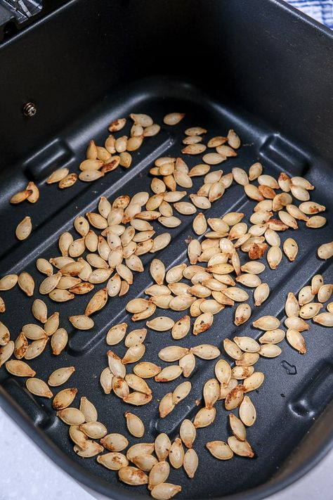 Want to make air fryer spaghetti squash seeds? Crispy roasted and ready in just minutes, this seasonal snack sure beats throwing them away! Roasted Squash Seeds Air Fryer, Air Fry Spaghetti Squash, Roasted Spaghetti Squash Seeds, Spaghetti Squash Seeds Roasted, Air Fryer Spaghetti Squash, Roasting Spaghetti Squash, Air Fryer Spaghetti, Spaghetti Squash Seeds, Roasted Squash Seeds