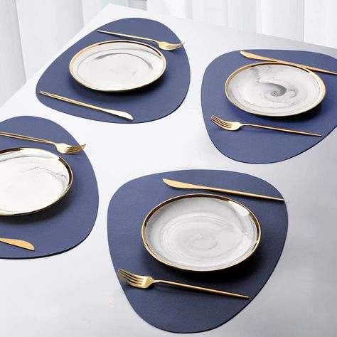 PRICES MAY VARY. ✔【MODERN DESIGN】Modern placemat with special shape and classic color can easily decorate your table, goes well with a round/oval table. ✔【HIGH QUALITY】Quality PU leather, resist fading, strong and durable, will not roll up, can be used for a long time. ✔【PROTECT YOUR TABLE】Thick placemats protect your table top from warm plates and bowls. Protect your table from scratches and stains and reduces noise from flatware. ✔【EASY CARE】Easy to clean and care, Washable table placemat. Wip Latest Dining Table, Leather Placemats, Table Placemat, Plate Mat, Table Placemats, Oval Table, Plant Dyes, Linen Textile, Yellow Fabric