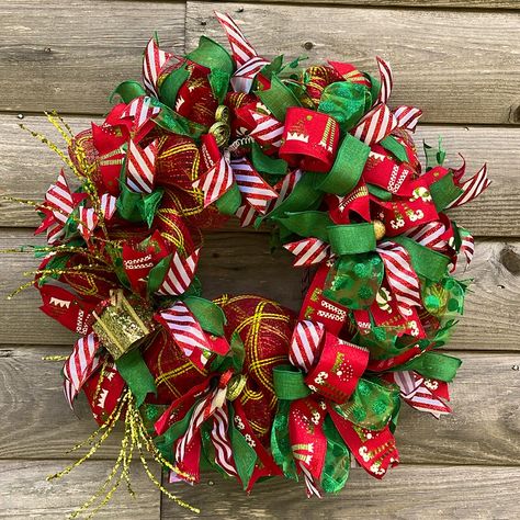 Christmas In July Sale! Brand New, Handmade, Indoor Deco Mesh Christmas Wreath. This Wreath Is Adorned With Candy Cane And Elf Ribbons To Enhance The Gold And Glittering Details. The Wreath Was Created On A Sturdy Metal Frame And Already Has The Hanger Attached. It Measures Around 27” Across And Comes From A Smoke Free Home. Please Like This Listing And I Will Send You An Offer For 25% Off. Winter Themed Wreaths, Christmas Wreaths With Ribbon, Christmas Deco Mesh Wreaths, Christmas Reef, Deco Mesh Christmas Wreath, Decorative Mesh Wreaths, Mesh Christmas Wreath, Deco Mesh Crafts, Grinch Wreath