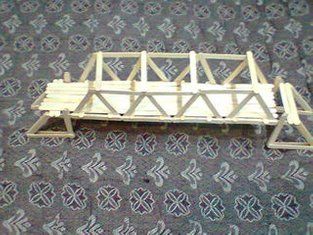 Bridge Prototype Using Ice-cream Sticks Clay Bridge, Popsicle Bridge, Bridge Craft, Popsicle Stick Bridges, Popsicle Stick Houses, Fairy Bed, Bridge Model, Diy Popsicle, Pop Stick