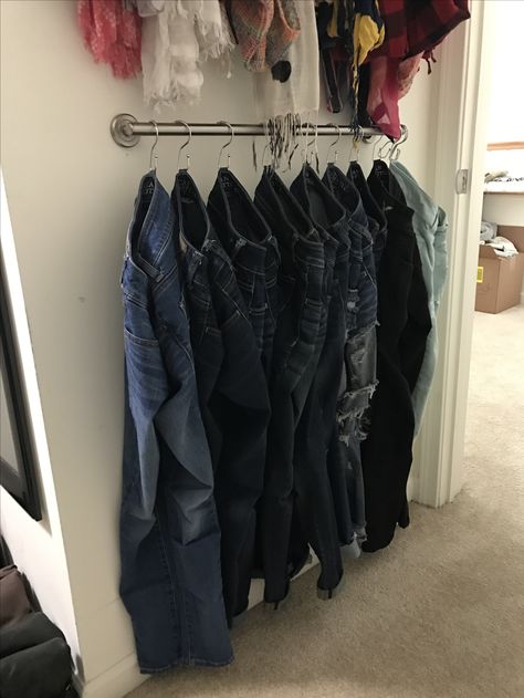 Jean Rack Closet Ideas, Towel Bar For Pants, Pants Hanging Ideas, Pant Hanger Ideas Closet Space, Diy Trouser Rack, Denim Bar Closet, Towel Rack Closet Hack, Hang Jeans With S Hook, Hanging Jeans On Hooks