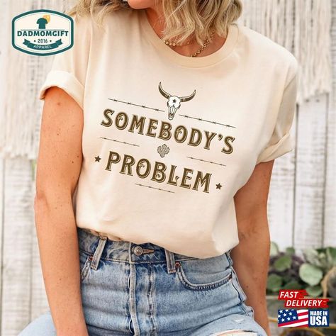 Somebody’S Problem Shirt Country Music Cowgirl T-Shirt Hoodie Check more at https://dadmomgift.com/product/somebody-s-problem-shirt-country-music-cowgirl-t-shirt-hoodie/ Somebodys Problem Shirt, Somebodys Problem, Howdy Shirt, Country Music Shirt, Country Music Shirts, Cowboy Shirt, Cowgirl Shirts, Cowboys Shirt, Film Prints