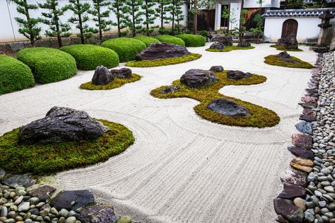 The rock garden at Myoren-ji, a Buddhist temple in Kyoto, features a traditional arrangement of stones, moss, and sand, while the perimeter includes rhododendrons and pine trees. The temple, destroyed twice by fires and reconstructed in its current incarnation in 1789, offers lodging for visitors year-round. Japanese Stone Garden, Garden Landscaping Design Ideas, Japanese Rock Garden, Zen Rock Garden, Japanese Garden Landscape, Zen Garden Design, Asian Landscape, Japanese Zen Garden, Rock Garden Plants