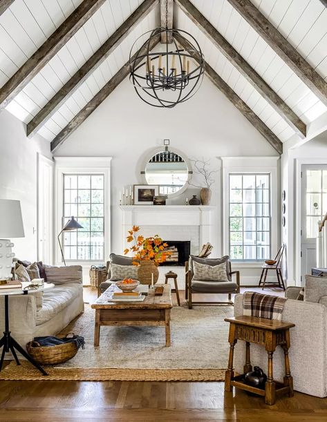 21 Modern Farmhouse Fireplace Ideas That Create Instant Charm Modern Farmhouse Fireplace Ideas, Black Brick Fireplace, Farmhouse Fireplace Ideas, Rustic Beams, Wood Ceiling Beams, Modern Farmhouse Fireplace, Sleek Fireplace, Beams Living Room, Reclaimed Wood Ceiling